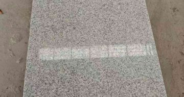 贵州芝麻白光面毛板