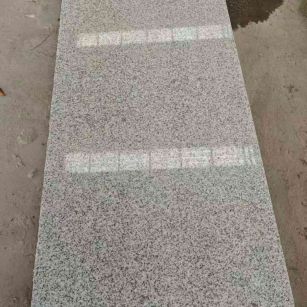 贵州芝麻白光面毛板