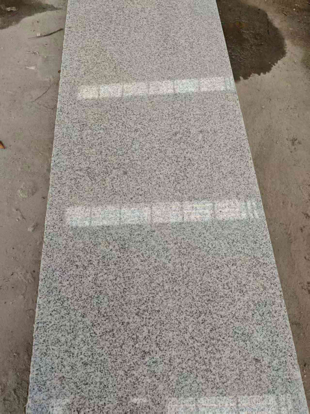 贵州芝麻白光面毛板